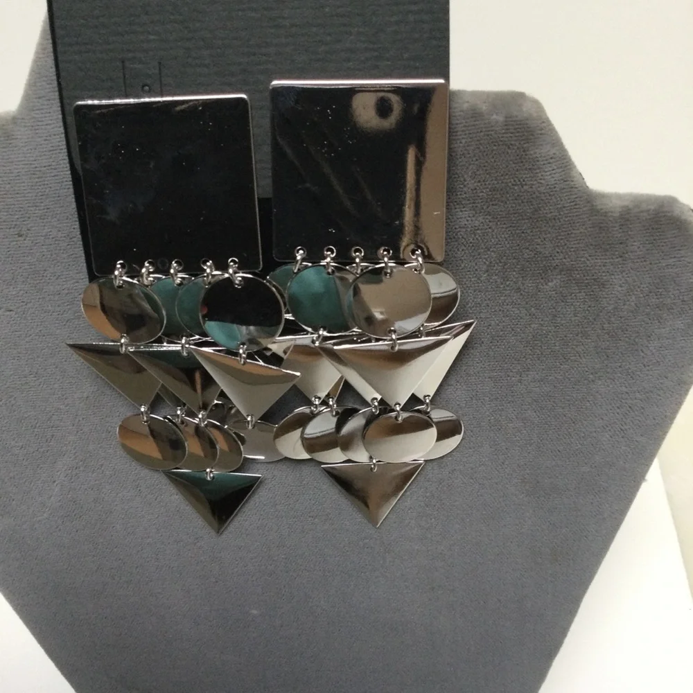Modern Silver Disc and Triangle Earring. - Picture 2 of 2